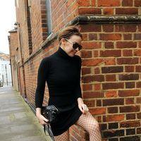 Kylie Minogue arriving at an office wearing a black outfit | Picture 111426